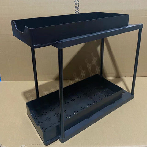 Two-tier pull-out storage rack. An organizational lifesaver for under the kitchen sink. Features adjustable shelves for easy storage of bottles and jars. In a sleek, modern design. Perfect as a kitchen shelf, bathroom organizer, or household storage solut