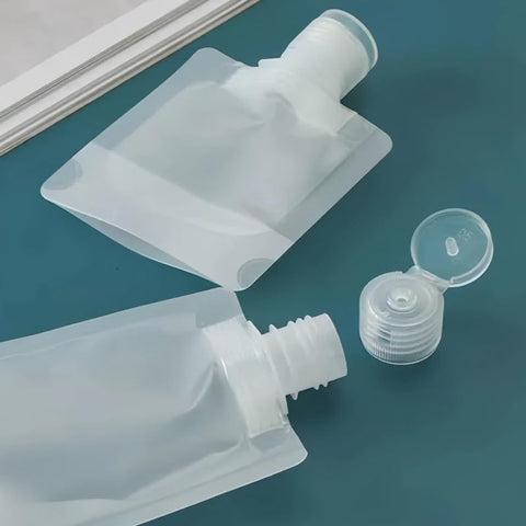 20 pieces - Travel-size Toiletries Bag - Travel Toiletries Containers - travel containers - refillable travel bottles - for cosmetics, lotions, shower gels, shampoos, travel essentials - 100 ml, 50 ml, 30 ml - with portable funnel - transparent