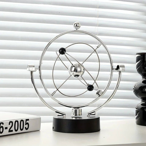 Newton's Cradle, an artistic craft piece for both home and office – a perpetual motion desktop ornament (requires 4 AA batteries to operate / batteries not included).