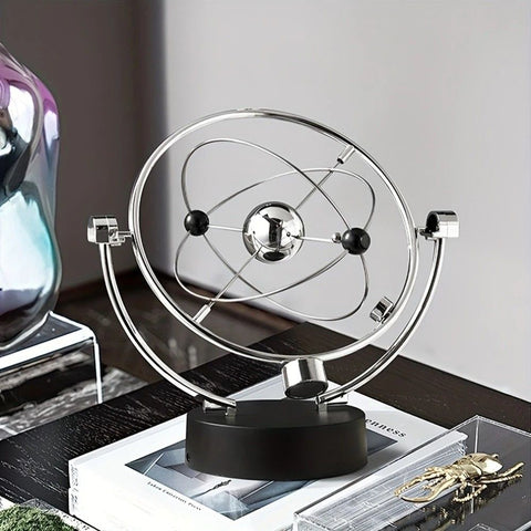 Newton's Cradle, an artistic craft piece for both home and office – a perpetual motion desktop ornament (requires 4 AA batteries to operate / batteries not included).