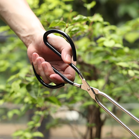 Long, sturdy, and heat-resistant charcoal tongs for grilling food. Made of stainless steel, these portable tongs are suitable for outdoor grilling, charcoal, and fire pits.